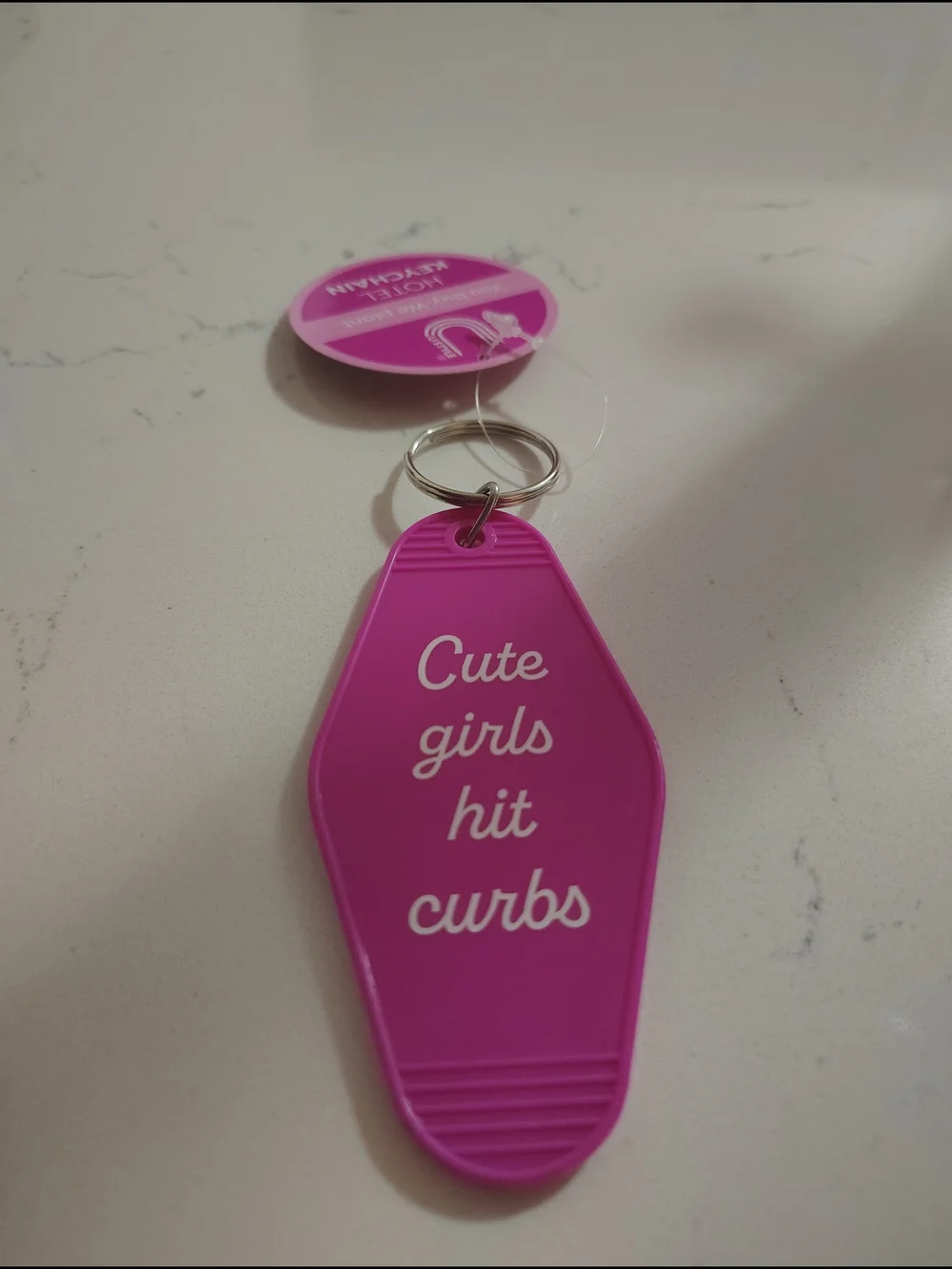 2 For $22🆕 Pink 'Cute girls hit curbs' Motel Keychain